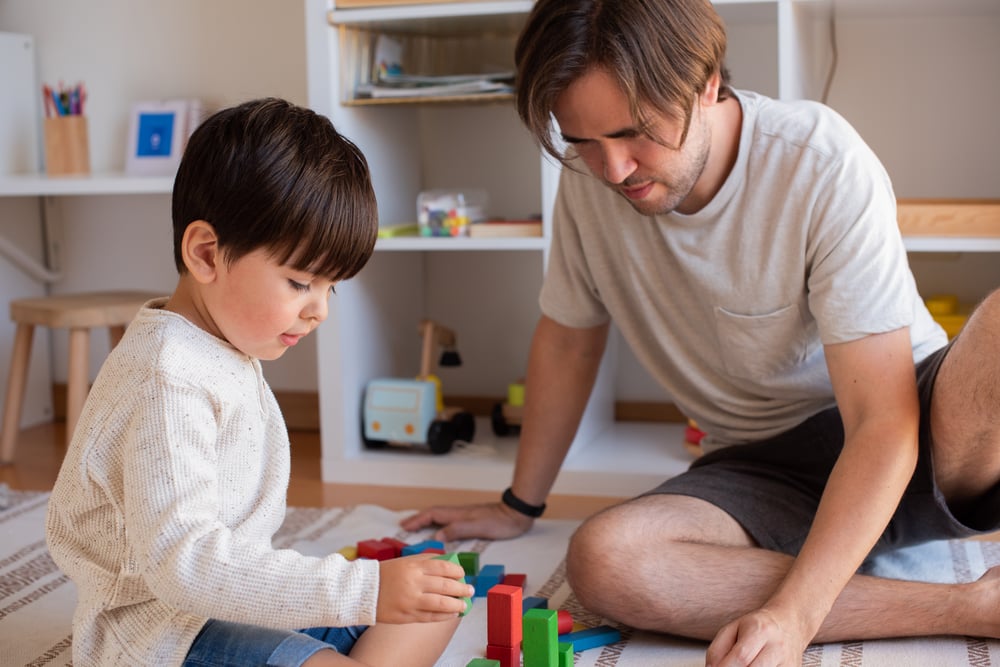 kid-and-his-father-playing-at-home-with-wood-build-2024-09-23-06-48-00-utc