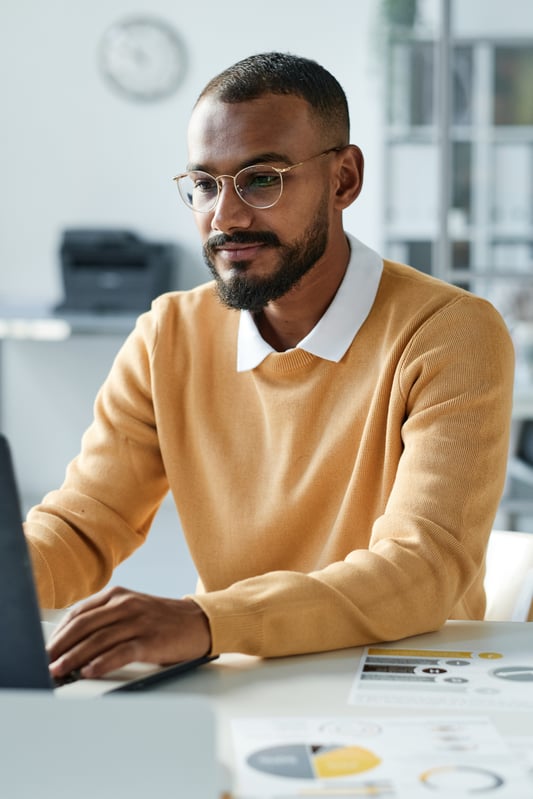 mixed-race-businessman-at-work-2023-11-27-05-23-45-utc (1)