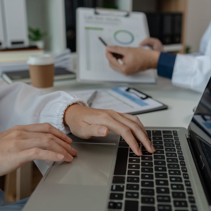 two-doctors-sat-in-a-private-office-at-the-hospita-2024-09-21-03-36-22-utc