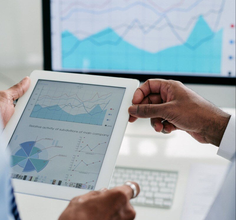 entrepreneurs-discussing-financial-chart-2023-11-27-05-27-14-utc-1