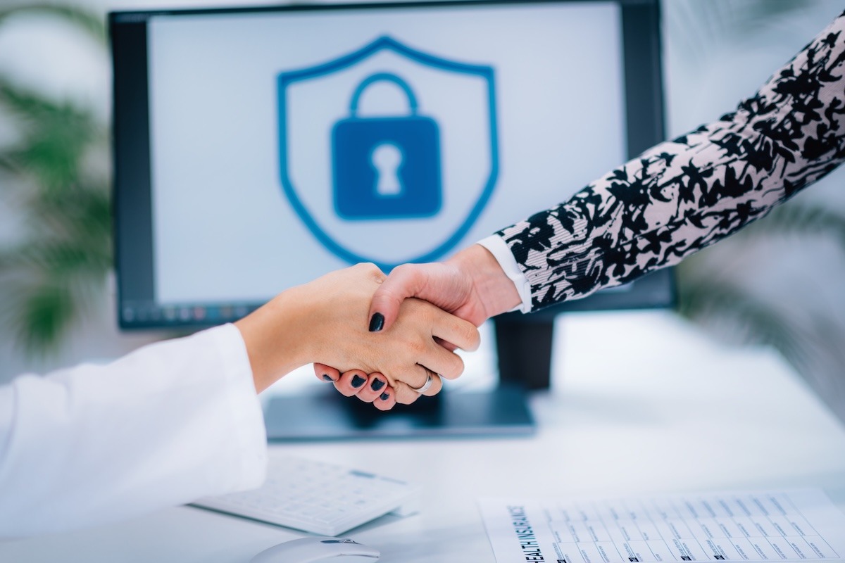 handshake-after-signing-medical-data-form-2024-10-20-09-46-19-utc